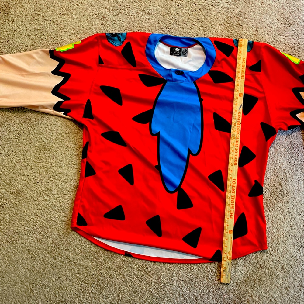 Brand new Atlanta Gladiators Flintstones Jersey, number 4.